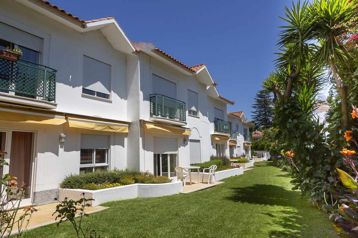 Private patios and lawns alongside the residence
